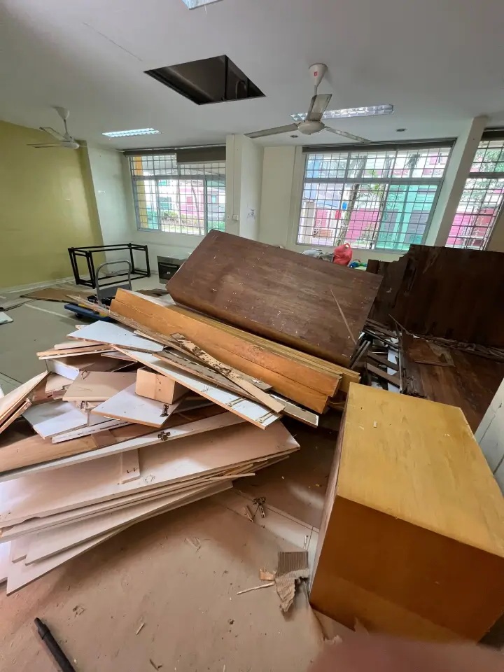 Furniture dismantle and disposal debris staged for haulage in Singapore